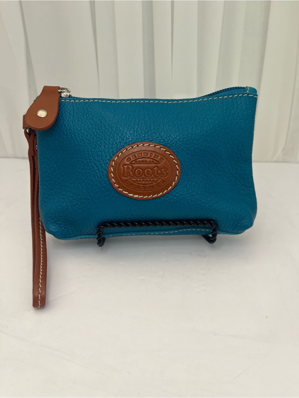 Roots Teal Leather Wristlet with Brown Trim and Logo Patch